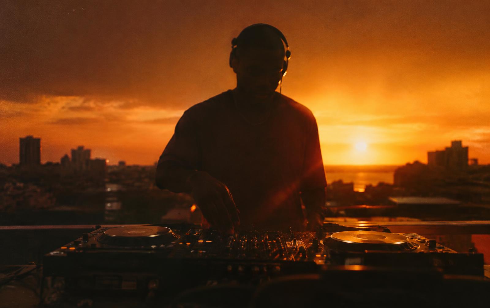 Llenrad Senyah on the decks at sunset